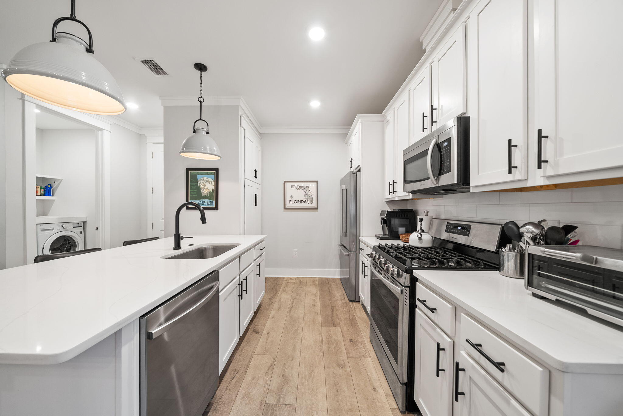 80 Bayou Edge Landing Santa Rosa Beach, FL 32459 - Photo 10 of 68 a kitchen with a sink stove and cabinets