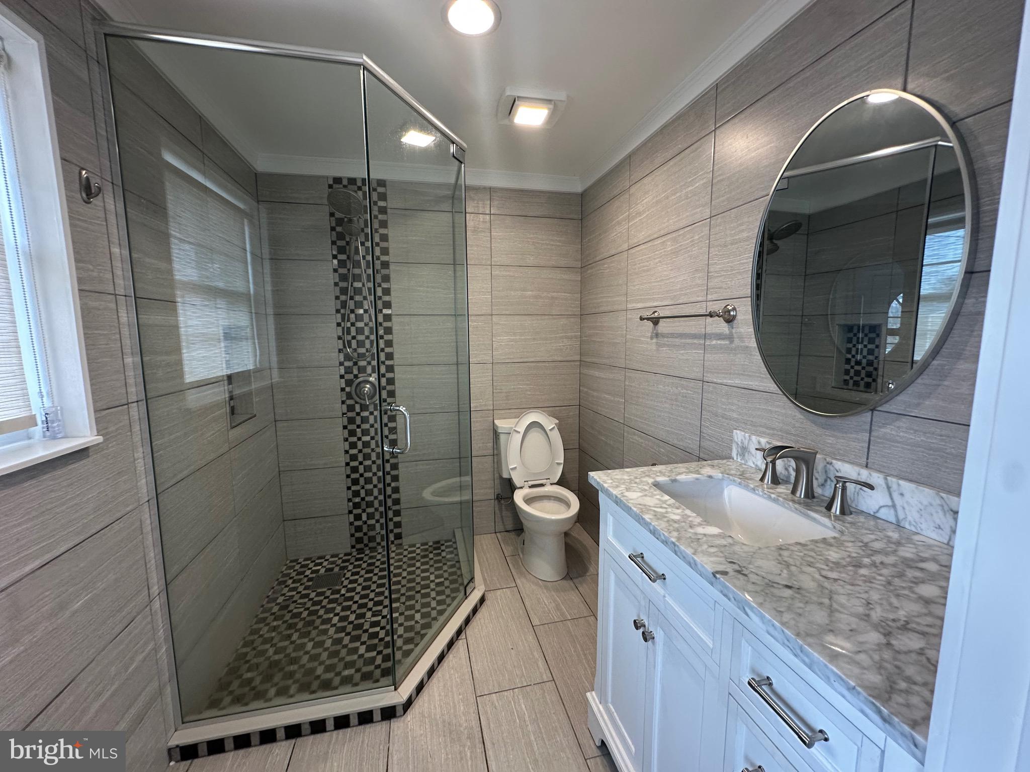120 Lebbie Lane Fairless Hills, PA 19030 - Photo 13 of 25 a bathroom with a sink and a mirror