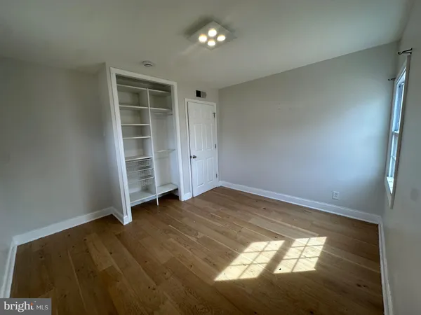 an empty room with closet