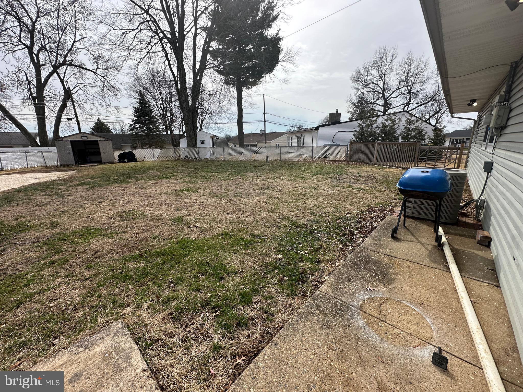 120 Lebbie Lane Fairless Hills, PA 19030 - Photo 22 of 25 a view of a yard with plants and trees
