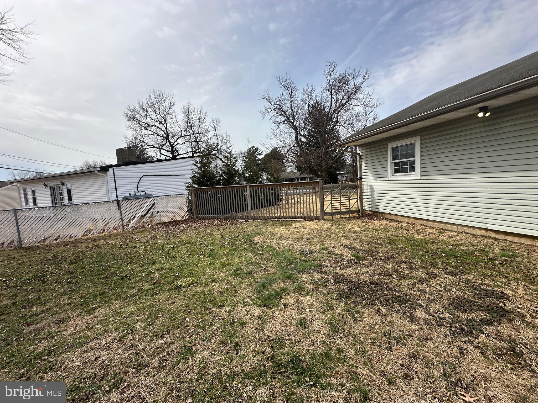 120 Lebbie Lane Fairless Hills, PA 19030 - Photo 24 of 25 a view of house with backyard and trees