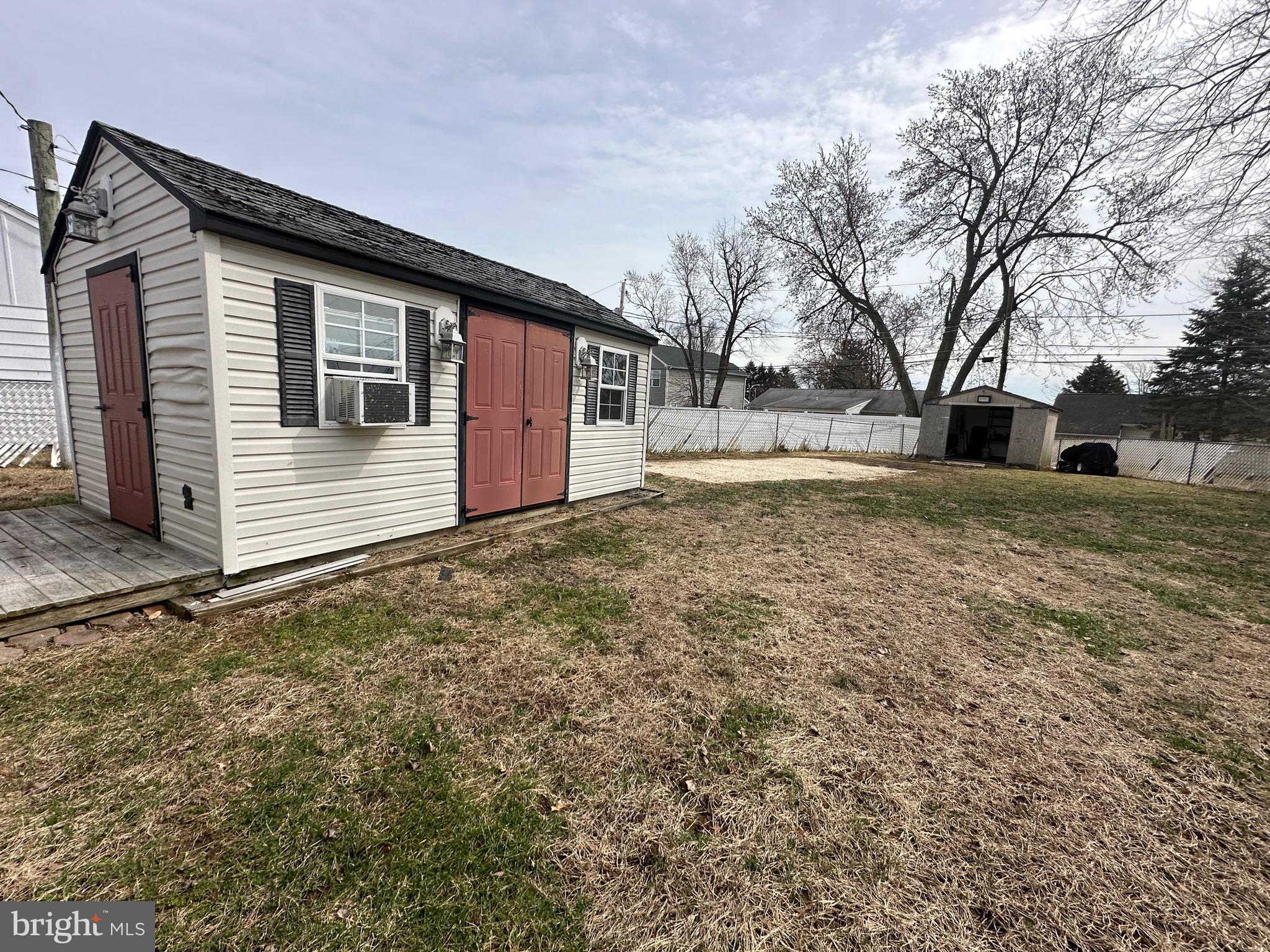 120 Lebbie Lane Fairless Hills, PA 19030 - Photo 25 of 25 a backyard of a house with large trees