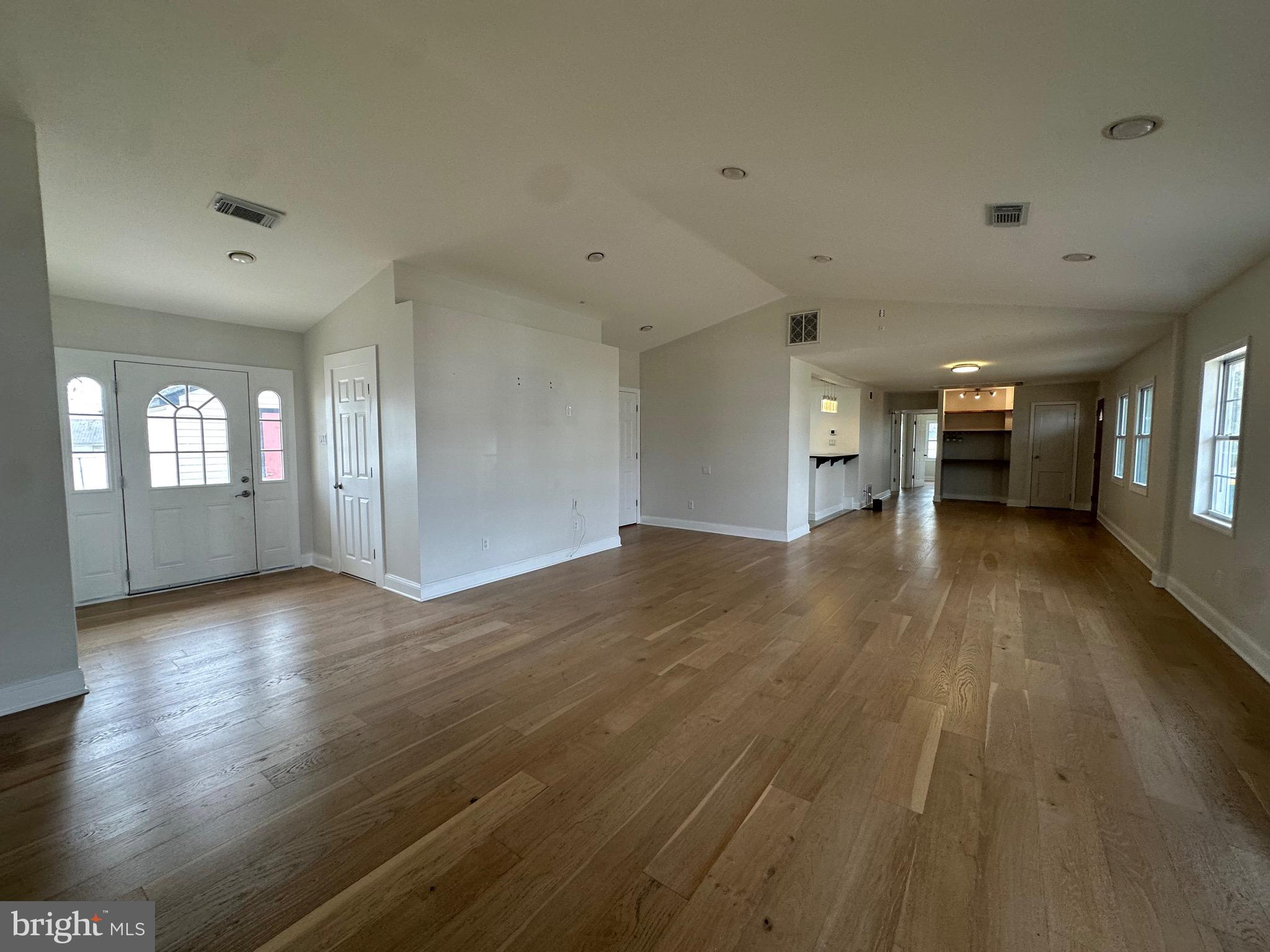 120 Lebbie Lane Fairless Hills, PA 19030 - Photo 8 of 25 a view of empty room with wooden floor and fan