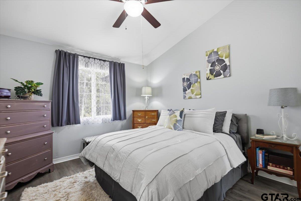 289 Acapulco Road Jefferson, TX 75657 - Photo 12 of 30 a bedroom with beds and a window
