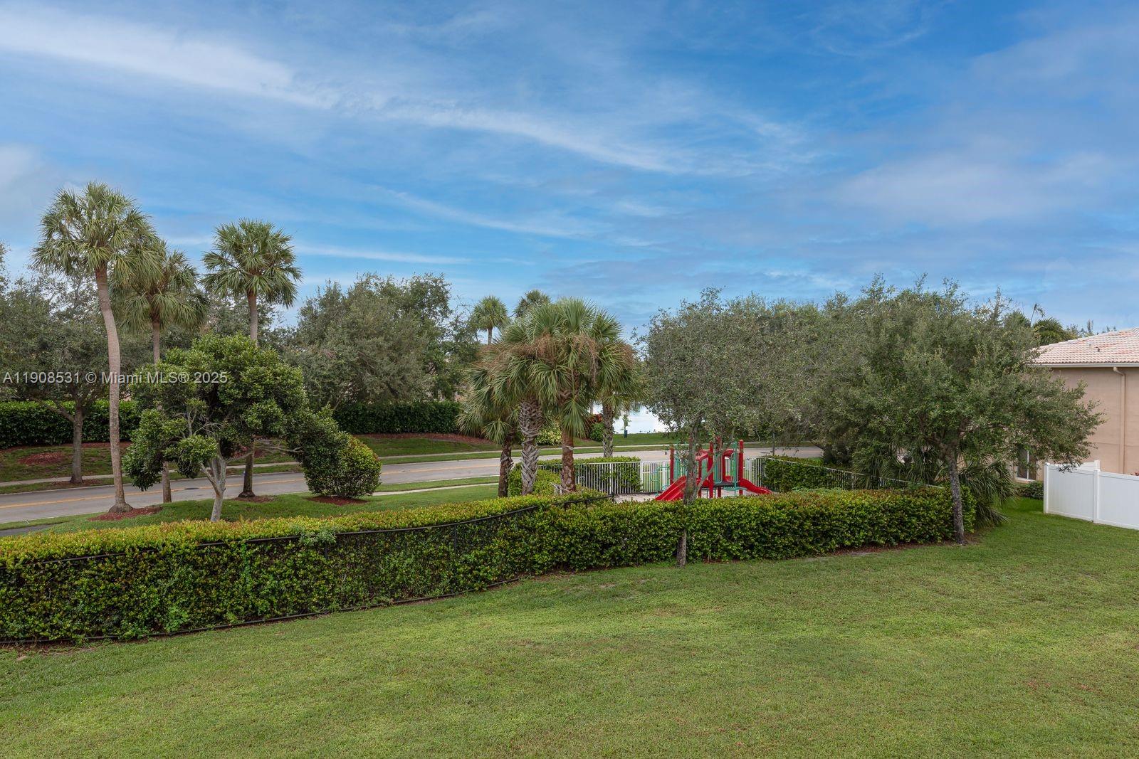 13216 Southwest 44th Street, Unit 11204 Miramar, FL 33027 - Photo 48 of 48 a front view of a house with a yard