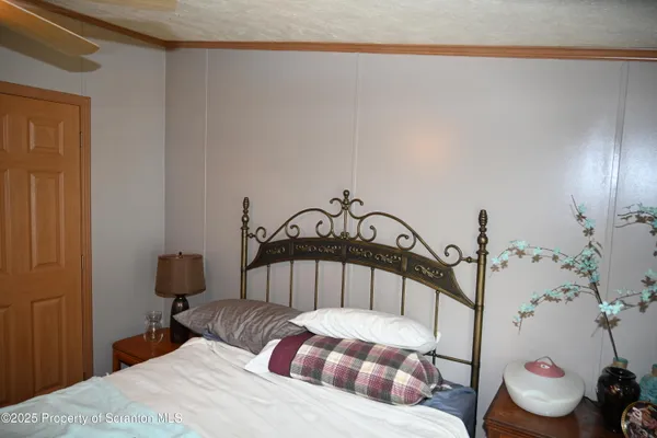 a room with gym equipment and windows