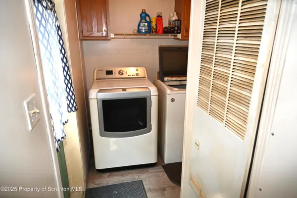 a view of a small house in the back yard