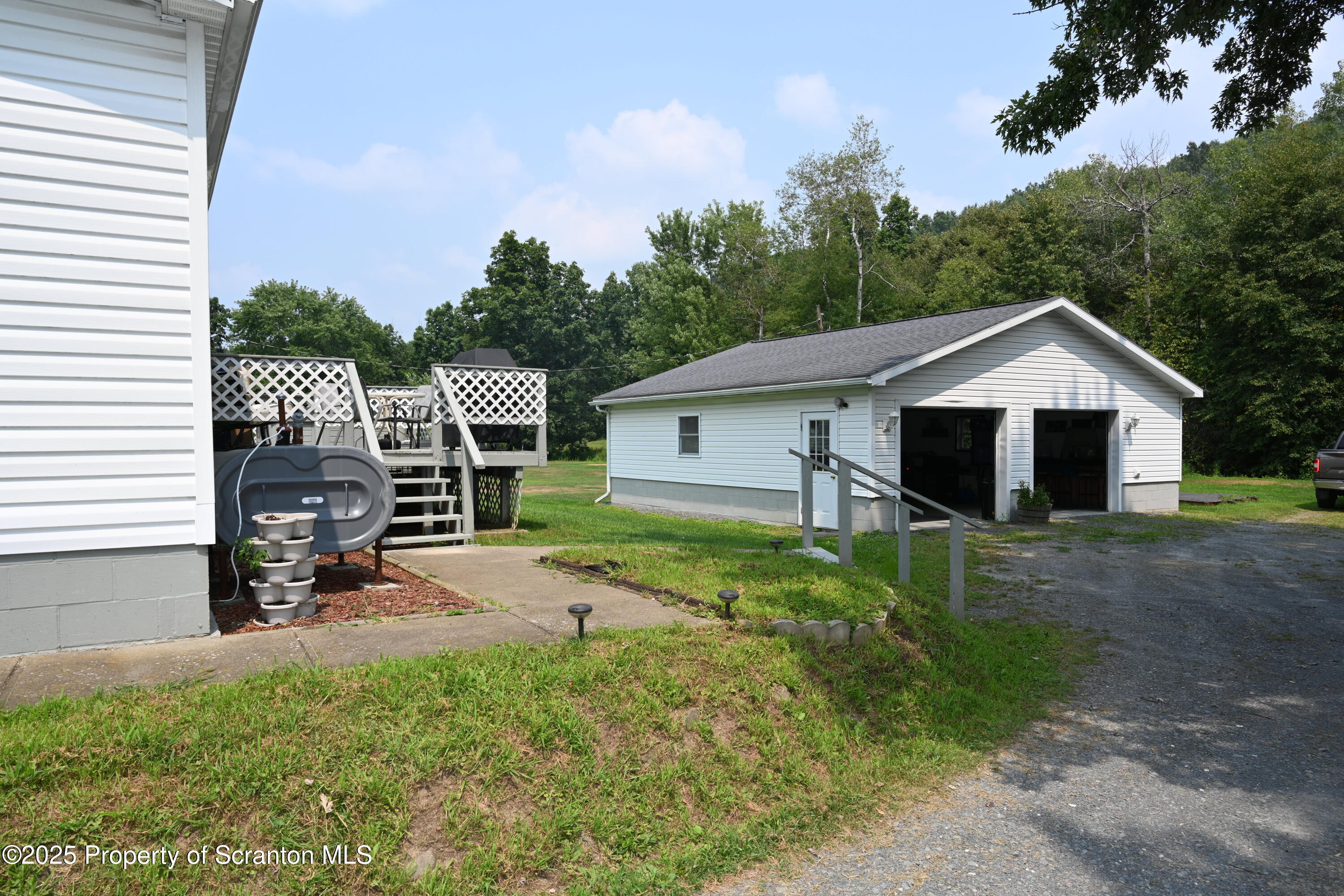 26930 Highway 11 Great Bend, PA 18821 - Photo 27 of 53 a view of a small house in the back yard