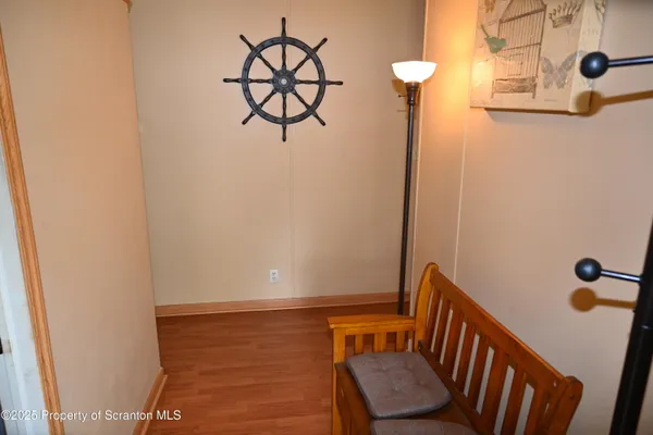 a view of a house with yard and garage