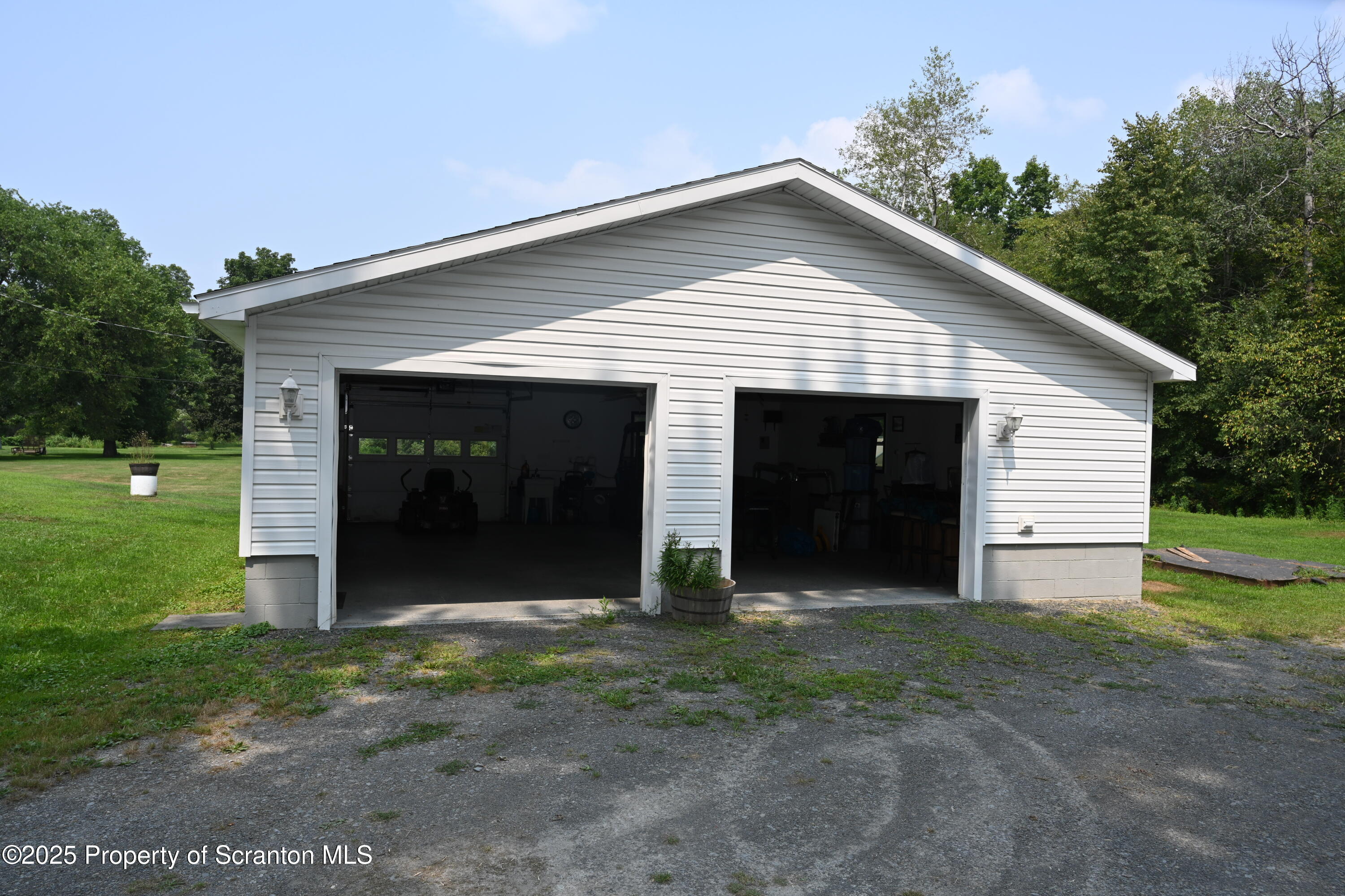 26930 Highway 11 Great Bend, PA 18821 - Photo 30 of 53 a view of a house with yard and garage