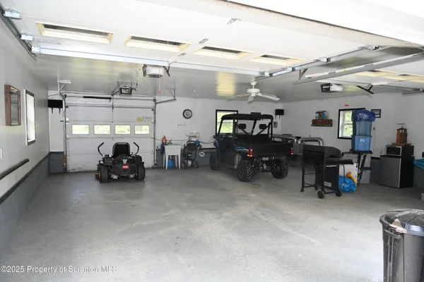 a view of a backyard with sitting area