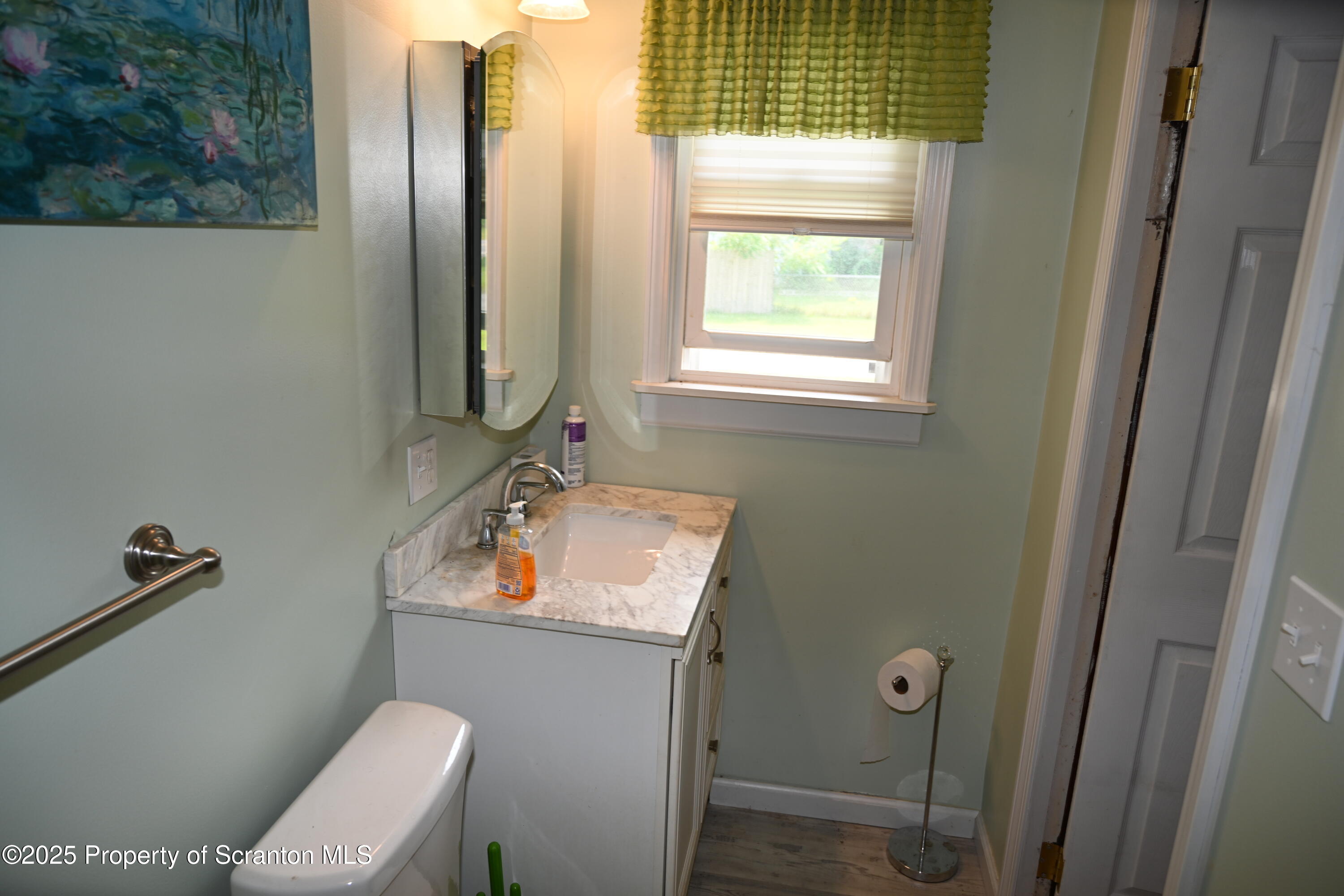 26930 Highway 11 Great Bend, PA 18821 - Photo 53 of 53 a bathroom with a sink toilet and shower