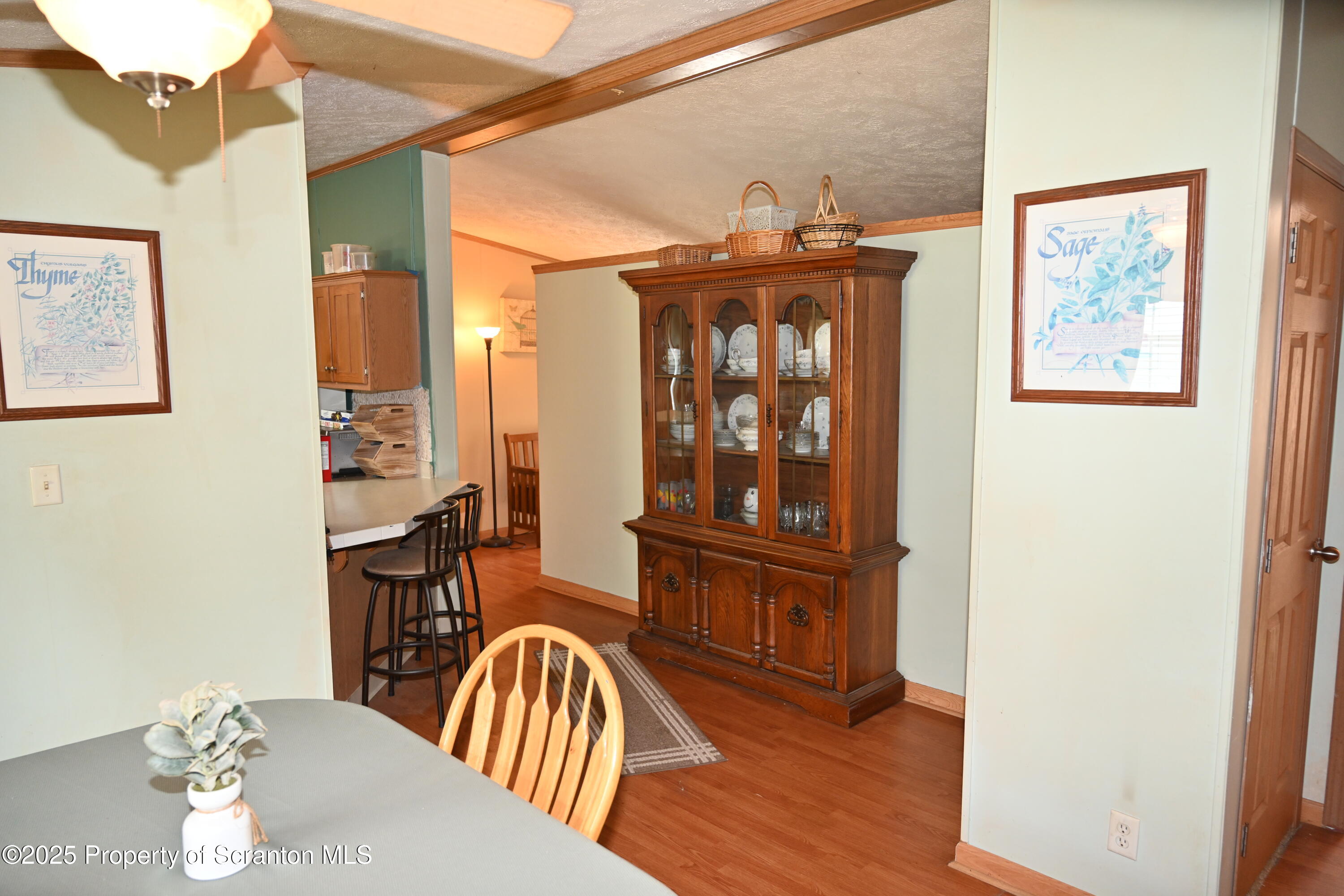 26930 Highway 11 Great Bend, PA 18821 - Photo 9 of 53 a view of a dining room with furniture window and wooden floor