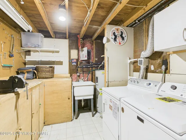 a view of a house with a snow on the road