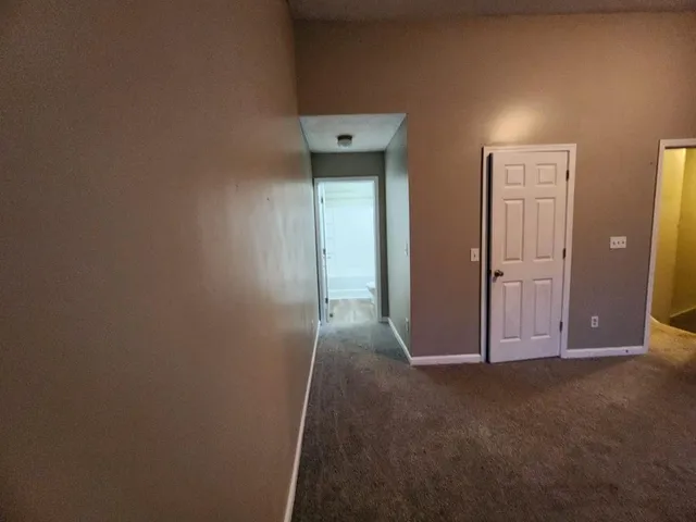 a bathroom with a tub and a shower