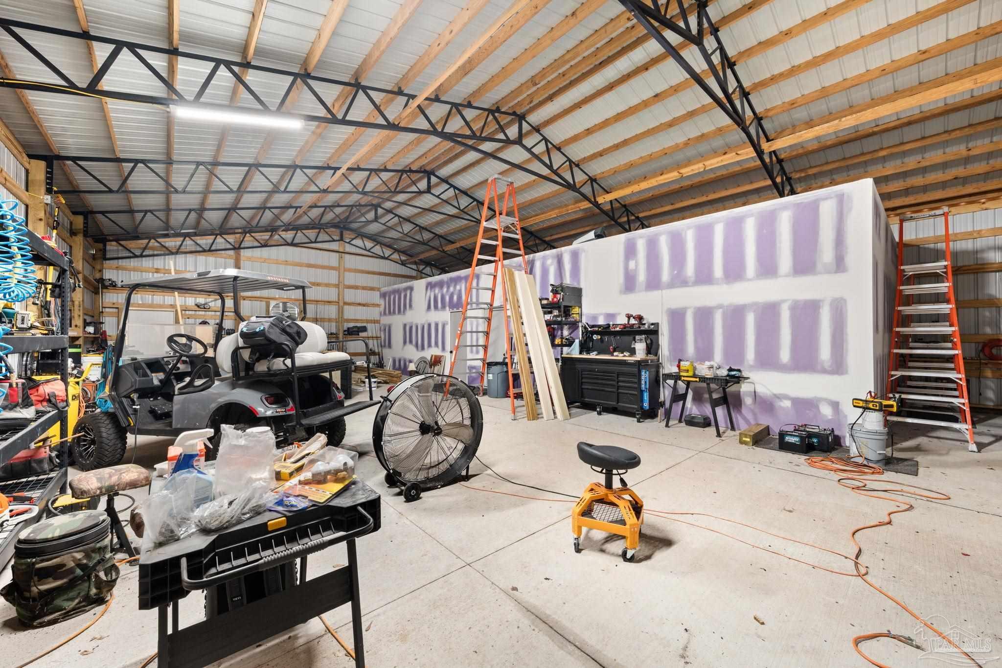 7716 Sunshine Hill Road Molino, FL 32577 - Photo 30 of 37 a view of a gym with equipment