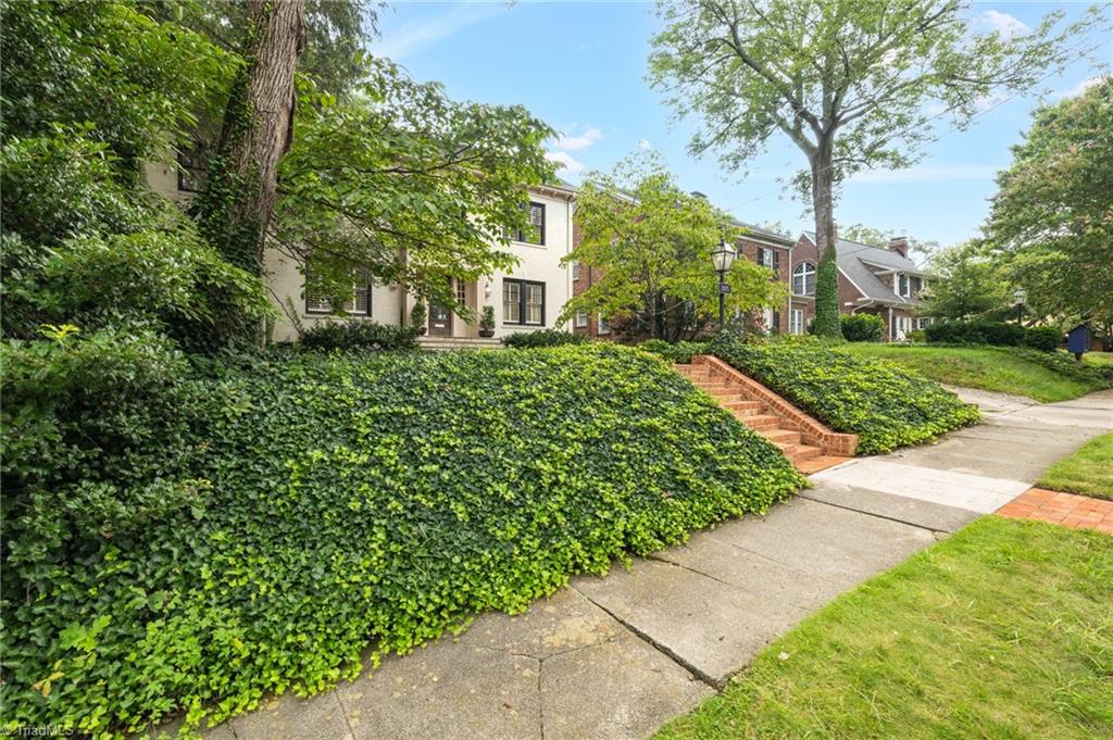 2105 Rolling Road Greensboro, NC 27403 - Photo 3 of 50 beautifully landscaped front yard