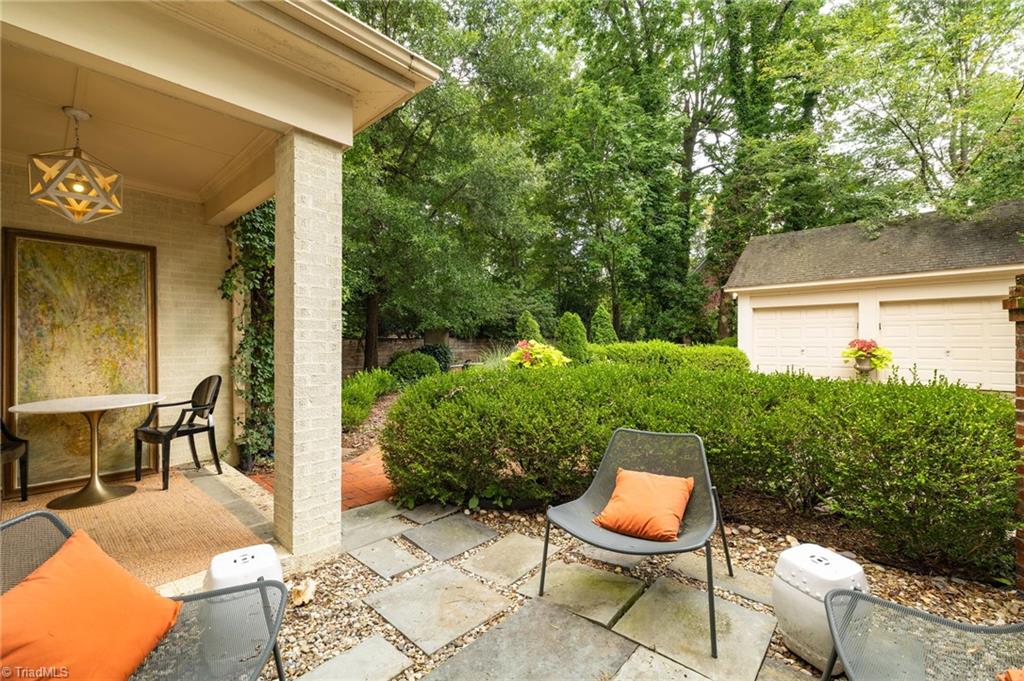 2105 Rolling Road Greensboro, NC 27403 - Photo 43 of 50 covered patio at the back entrance to the house