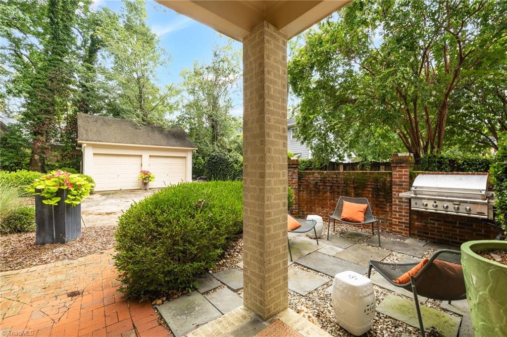 2105 Rolling Road Greensboro, NC 27403 - Photo 44 of 50 grilling and sitting area out the back door