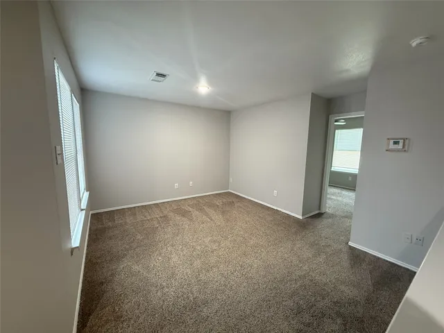 an empty room with a natural light