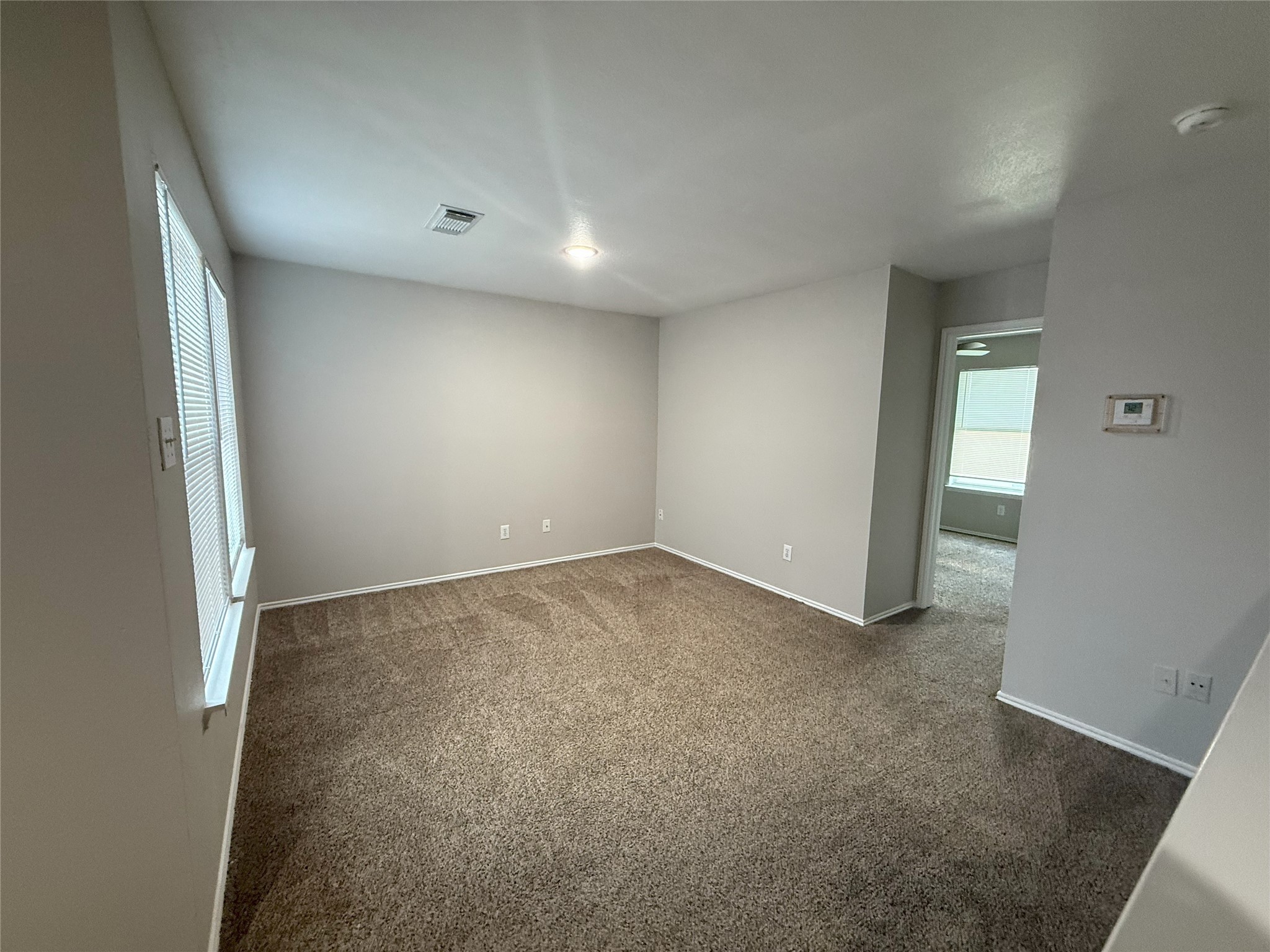 22819 Sugar Bear Drive Spring, TX 77389 - Photo 15 of 20 an empty room with a natural light