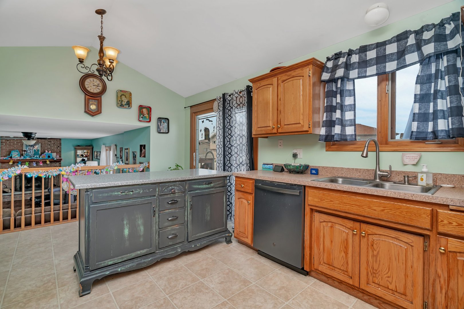 605 High Grove Drive Minooka, IL 60447 - Photo 15 of 42 a kitchen with a sink stove and microwave