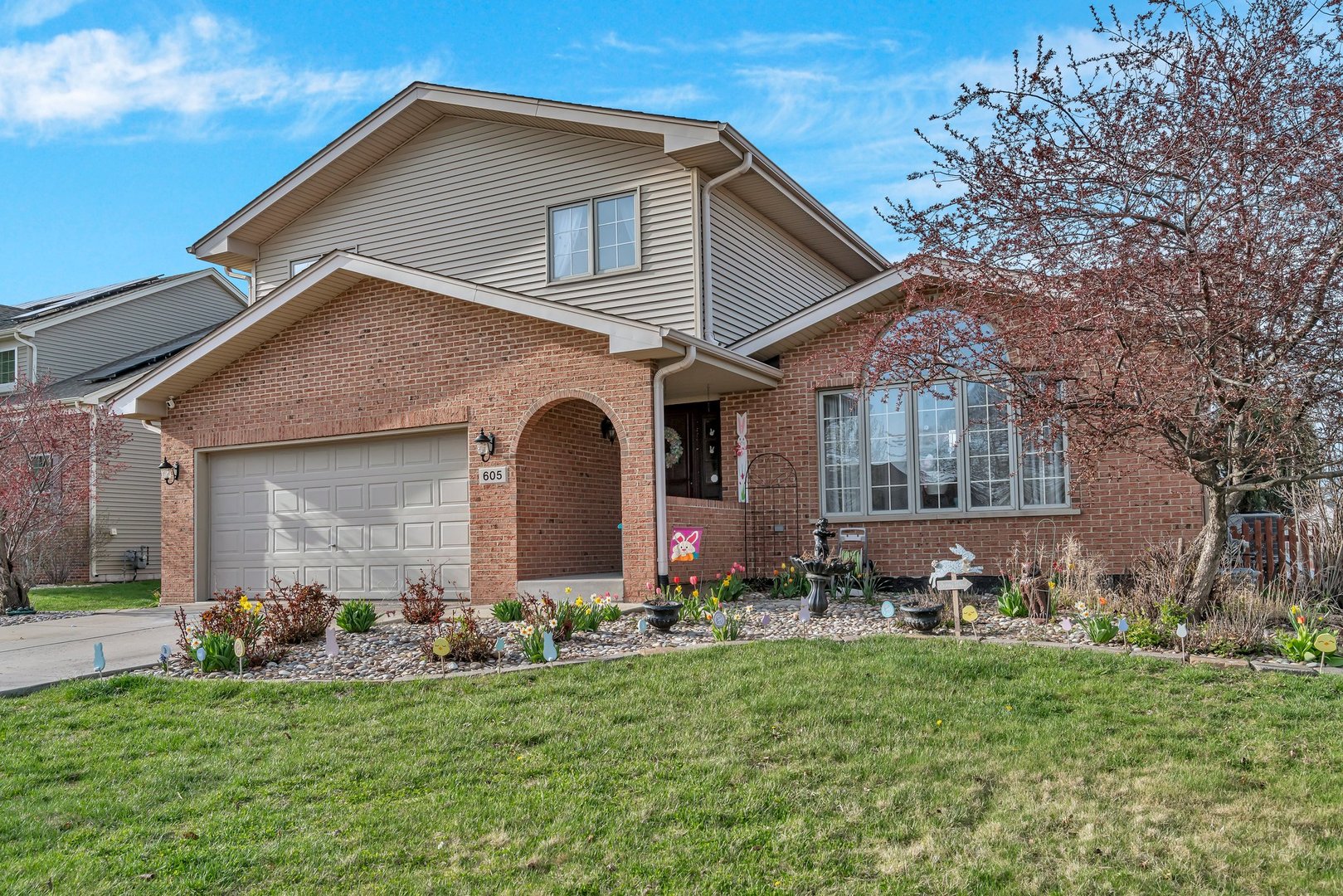 605 High Grove Drive Minooka, IL 60447 - Photo 2 of 42 a front view of house with yard and green space