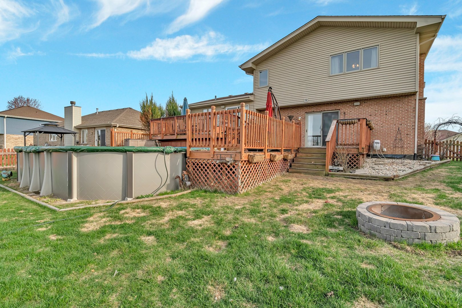605 High Grove Drive Minooka, IL 60447 - Photo 36 of 42 a view of a house with backyard and sitting area