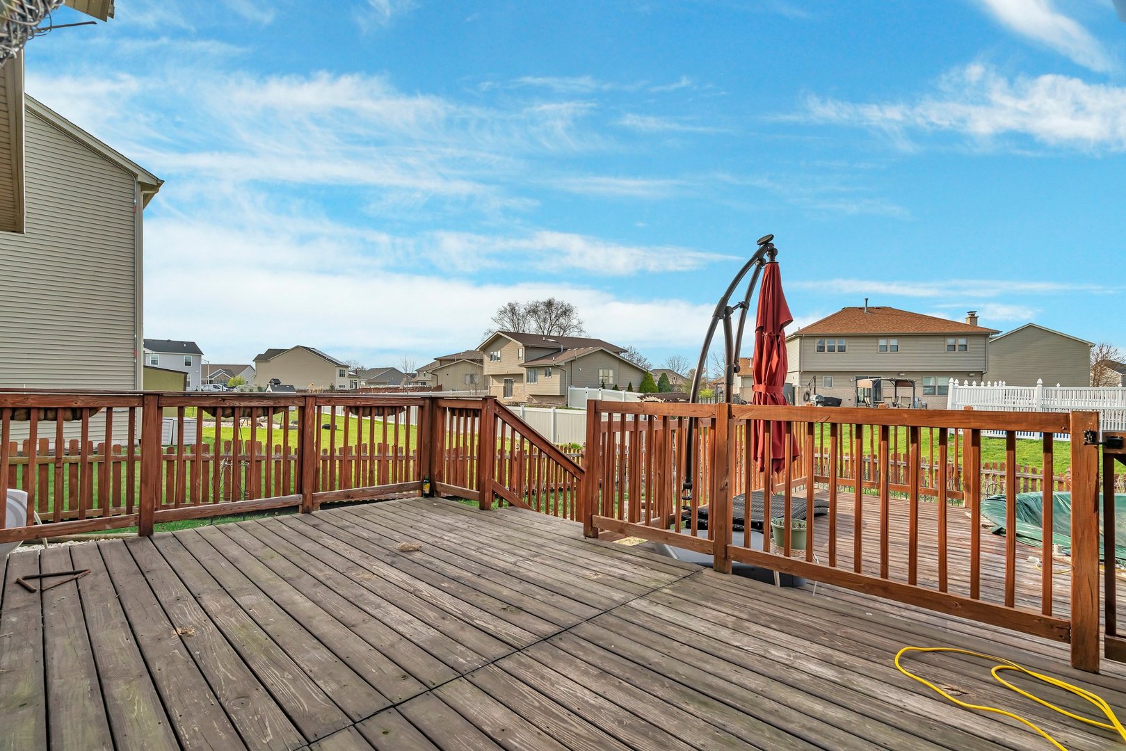 605 High Grove Drive Minooka, IL 60447 - Photo 39 of 42 a view of a balcony with wooden floor