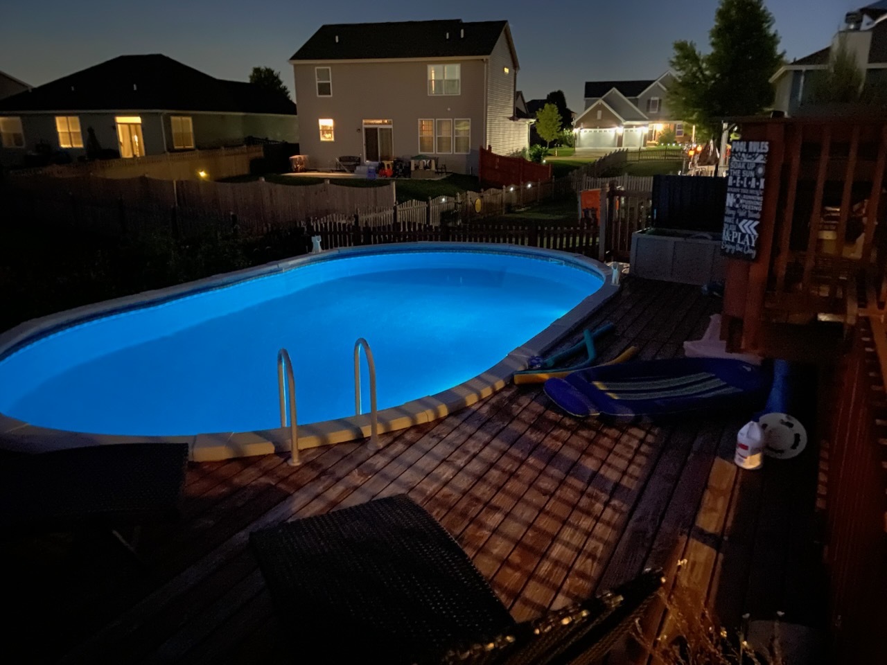 605 High Grove Drive Minooka, IL 60447 - Photo 42 of 42 a view of a swimming pool with an outdoor seating kitchen