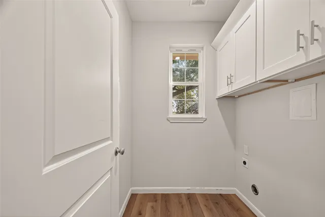 a view of a room that has a window in it