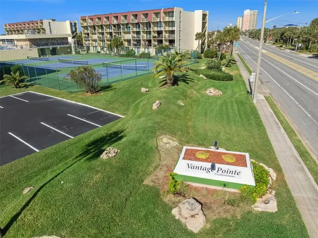 a view of a kitchen with a small space and a window