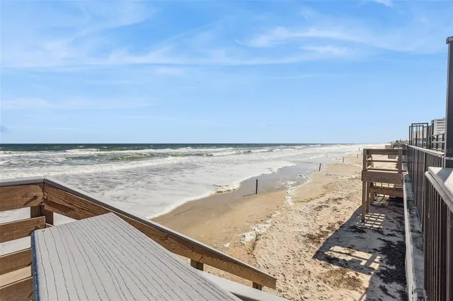 a view of a door of the house with a street