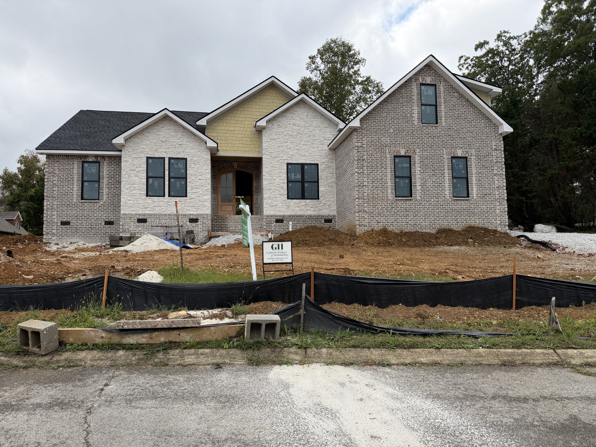 a front view of a house with swimming pool