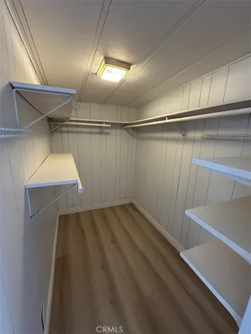 a view of a room with racks on the wall