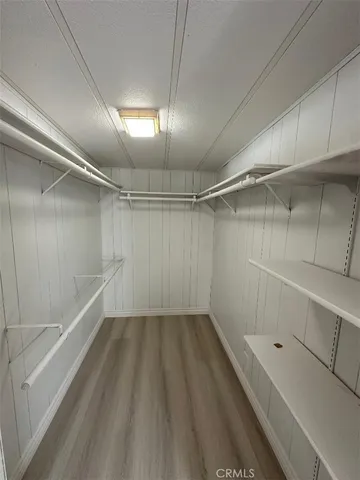 a view of a room with racks on the wall