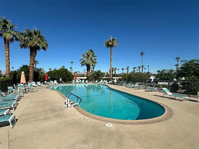 a view of a swimming pool and outdoor space