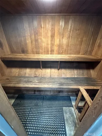 a gym room with lots of gym equipment