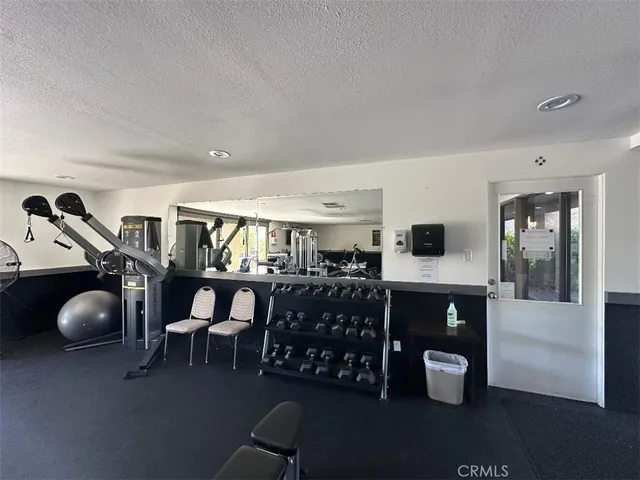 a view of a room with gym equipment