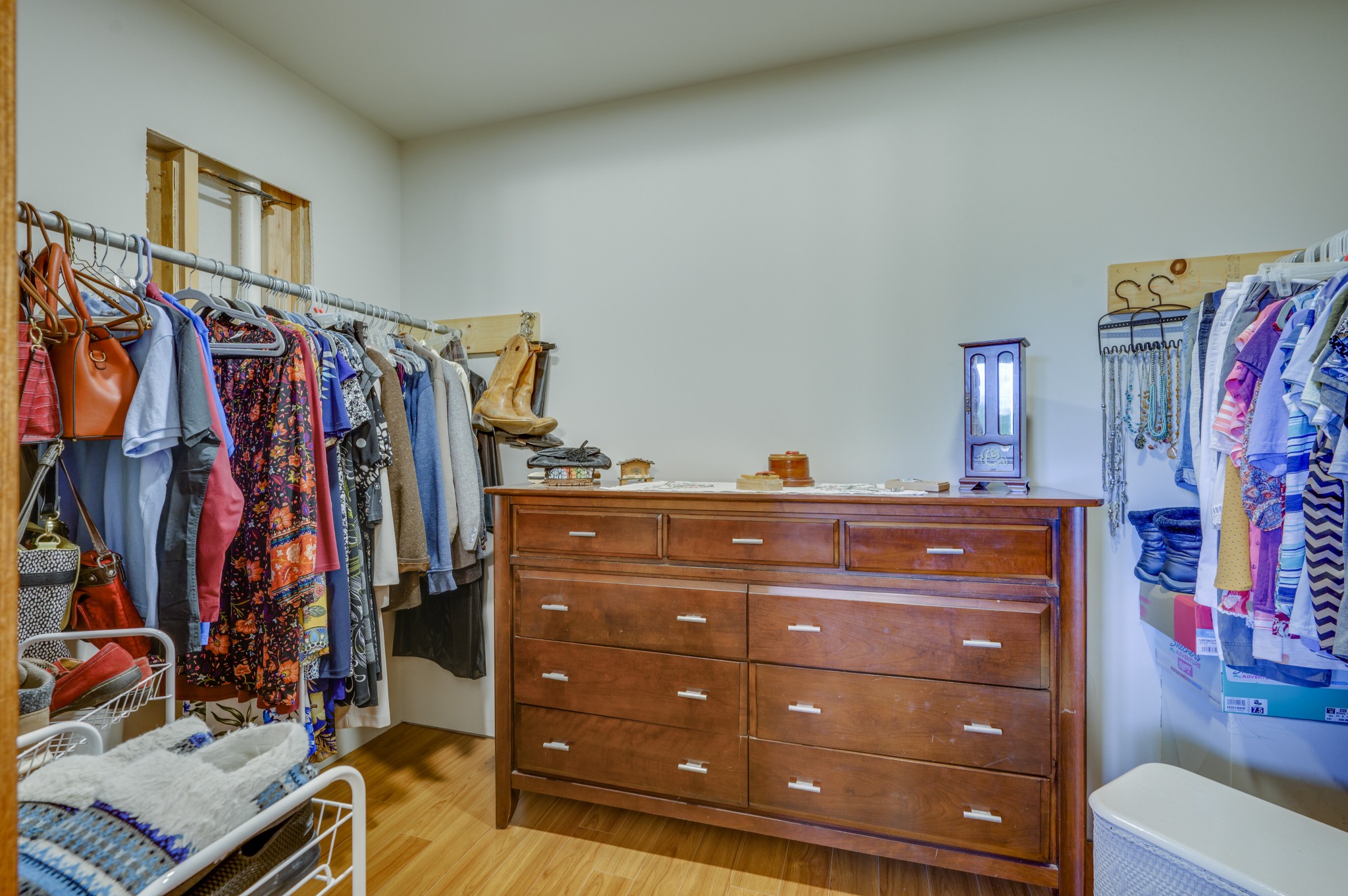 782 Busby Road Westpoint, TN 38486 - Photo 22 of 60 a view of walk in closet with clothes