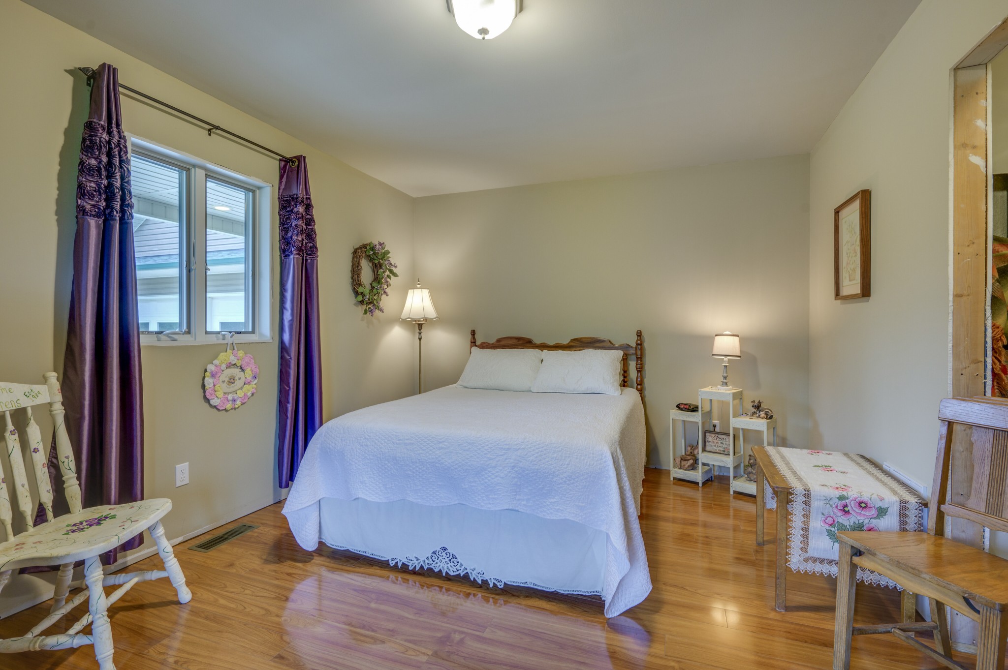 782 Busby Road Westpoint, TN 38486 - Photo 26 of 60 a bedroom with a bed and wooden floor