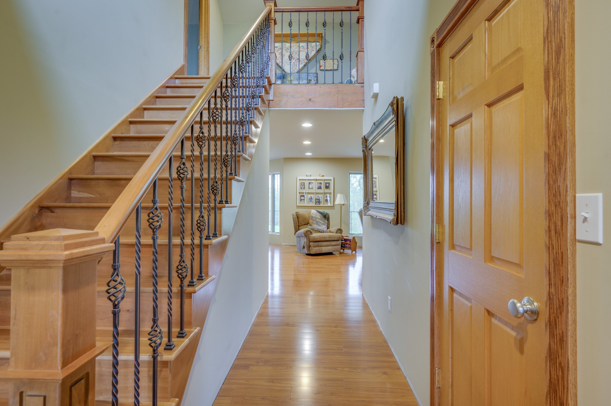 782 Busby Road Westpoint, TN 38486 - Photo 8 of 60 a view of a hallway with wooden floor and staircase