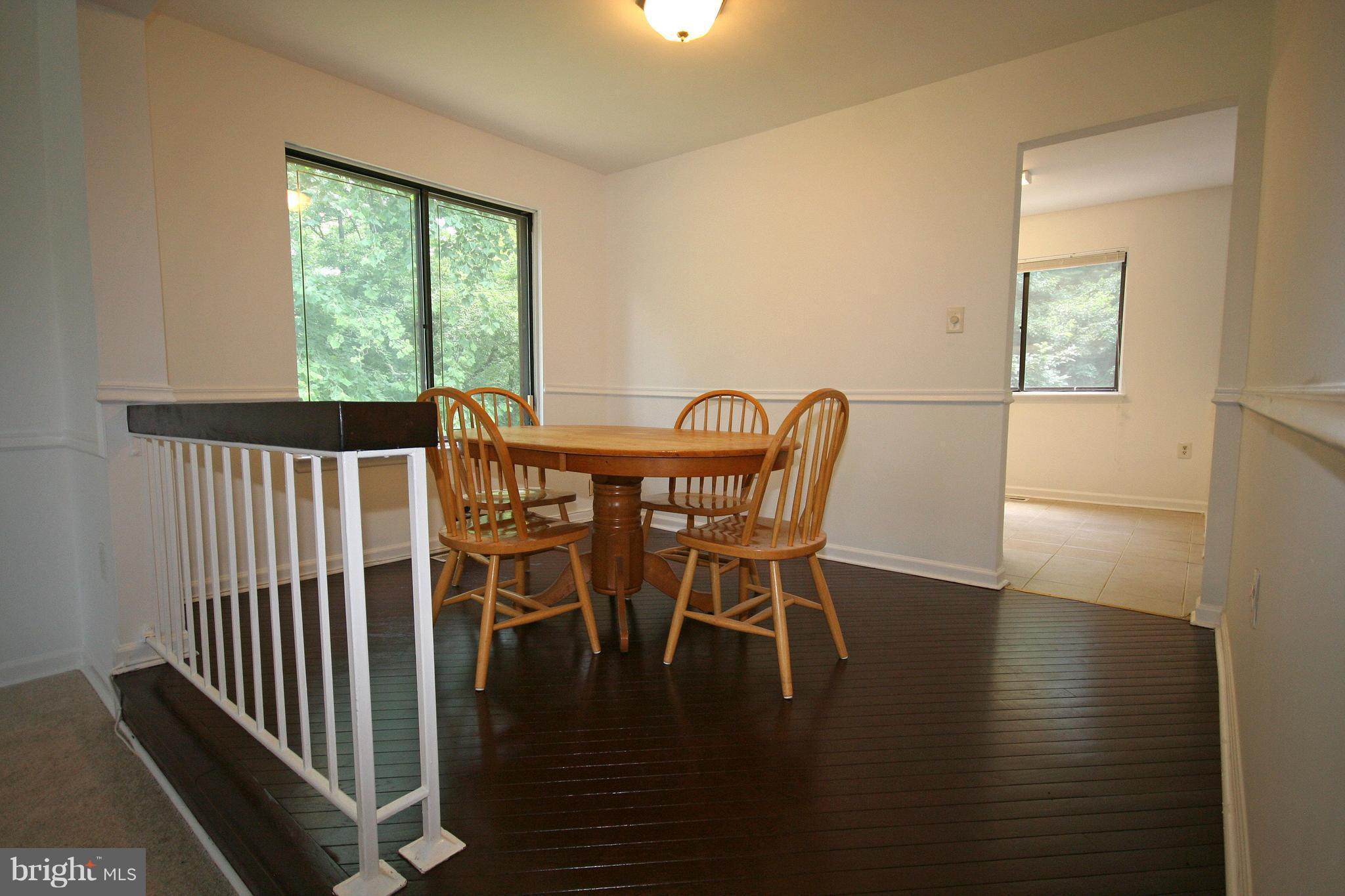 8947 Centerway Road Gaithersburg, MD 20879 - Photo 7 of 25 Dining Room With Nature Views