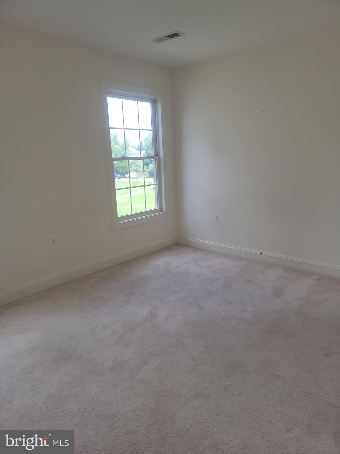 915 Virginia Avenue Culpeper, VA 22701 - Photo 13 of 24 an empty room with a window