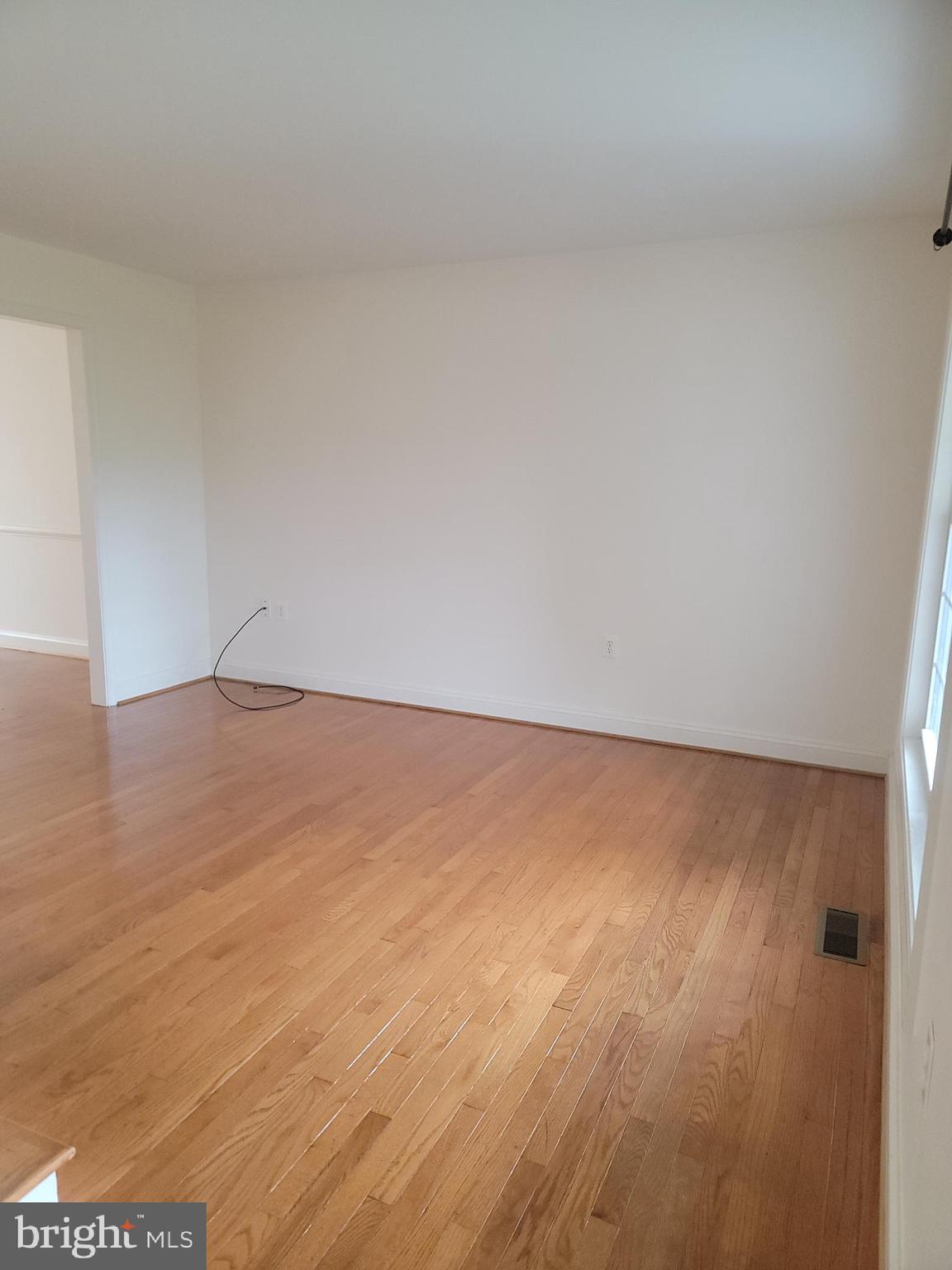 915 Virginia Avenue Culpeper, VA 22701 - Photo 4 of 24 a view of empty room with wooden floor