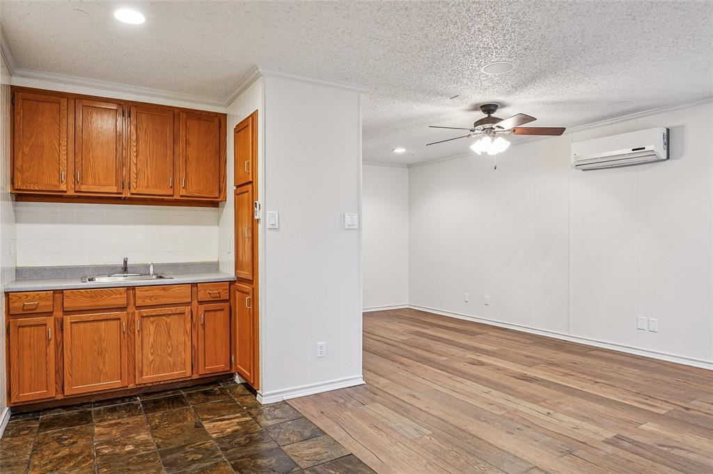 1006 Cochran Road Argyle, TX 76226 - Photo 24 of 40 Separate living quarters with kitchenette, Indian slate entry and beautiful wood floors