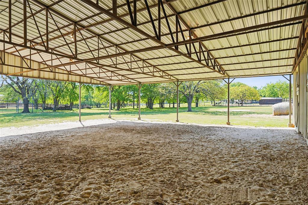 1006 Cochran Road Argyle, TX 76226 - Photo 29 of 40 1,600 sqft covered area great for keeping animals safe from the hot sun and bad weather