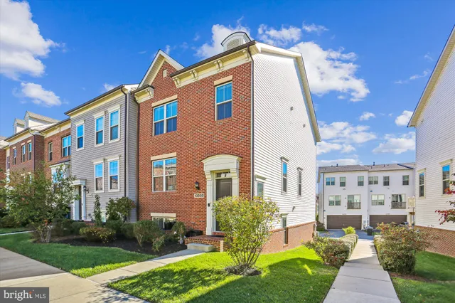 a front view of a building with garden
