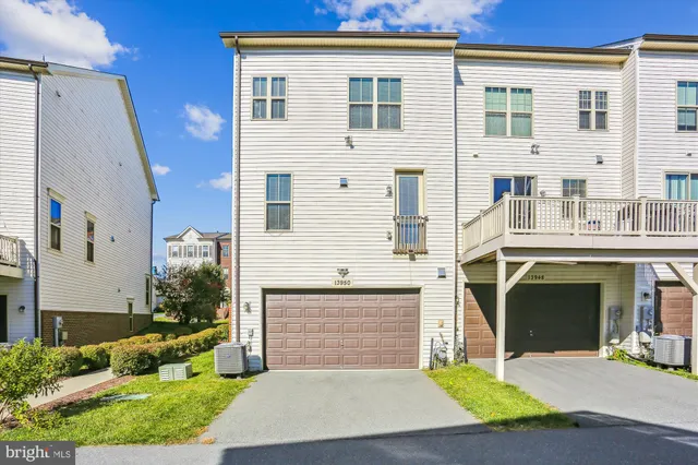 a front view of a house with yard