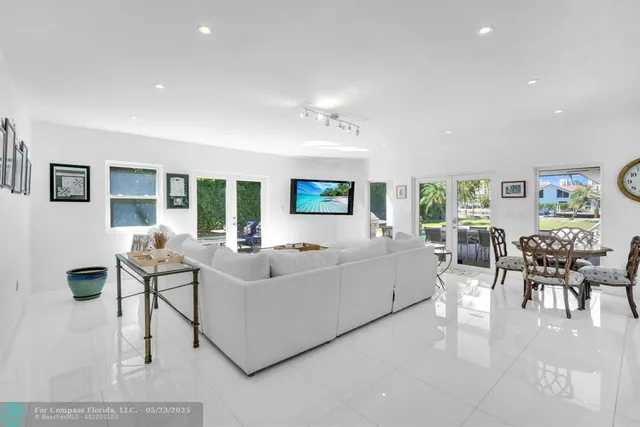 a view of a livingroom with furniture and lounge chair